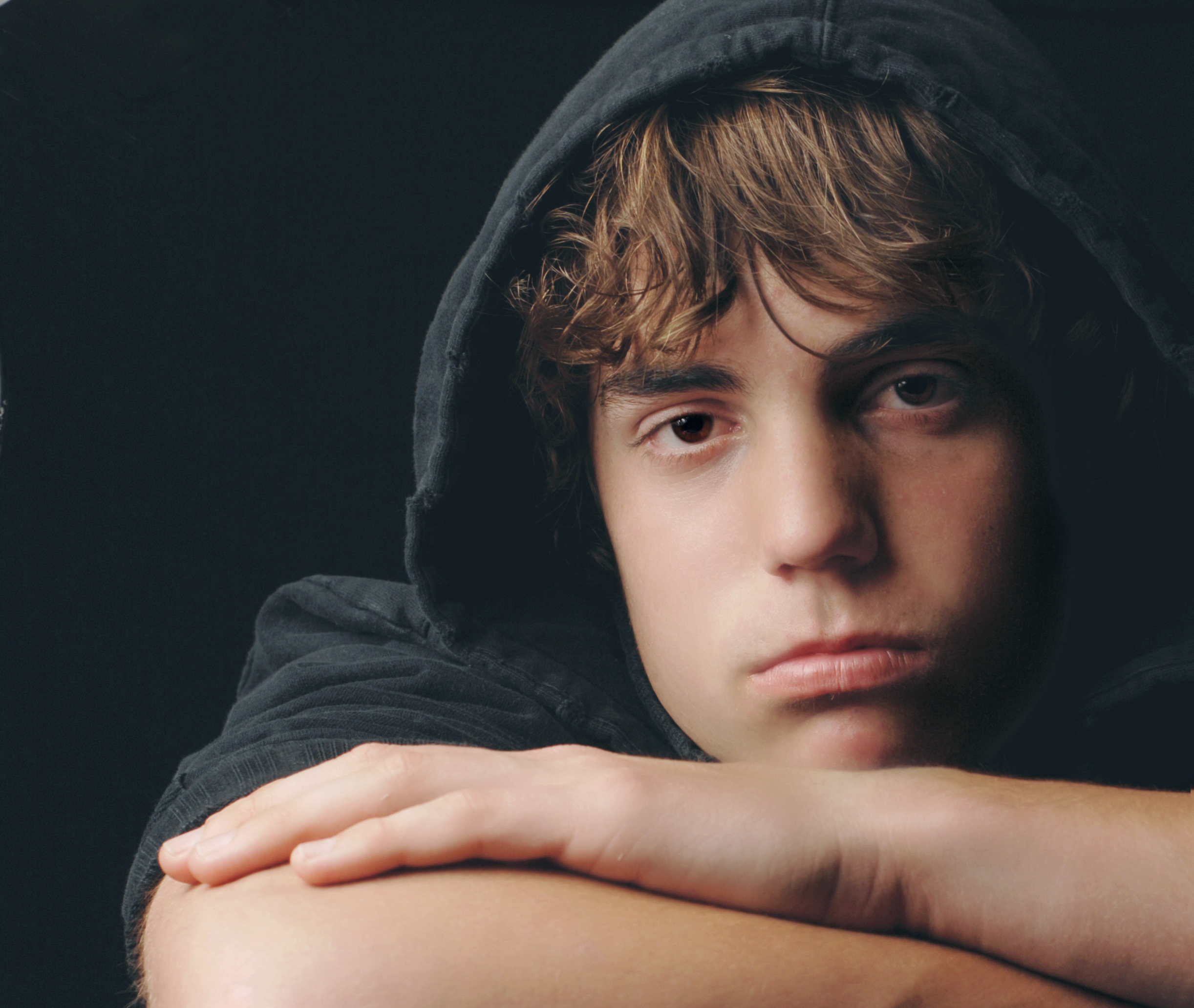 teenager-in-hoodie-close-up-shutterstock