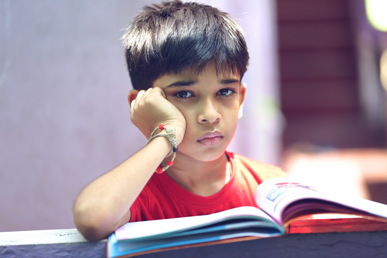 Depressed School boy Posing to Camera