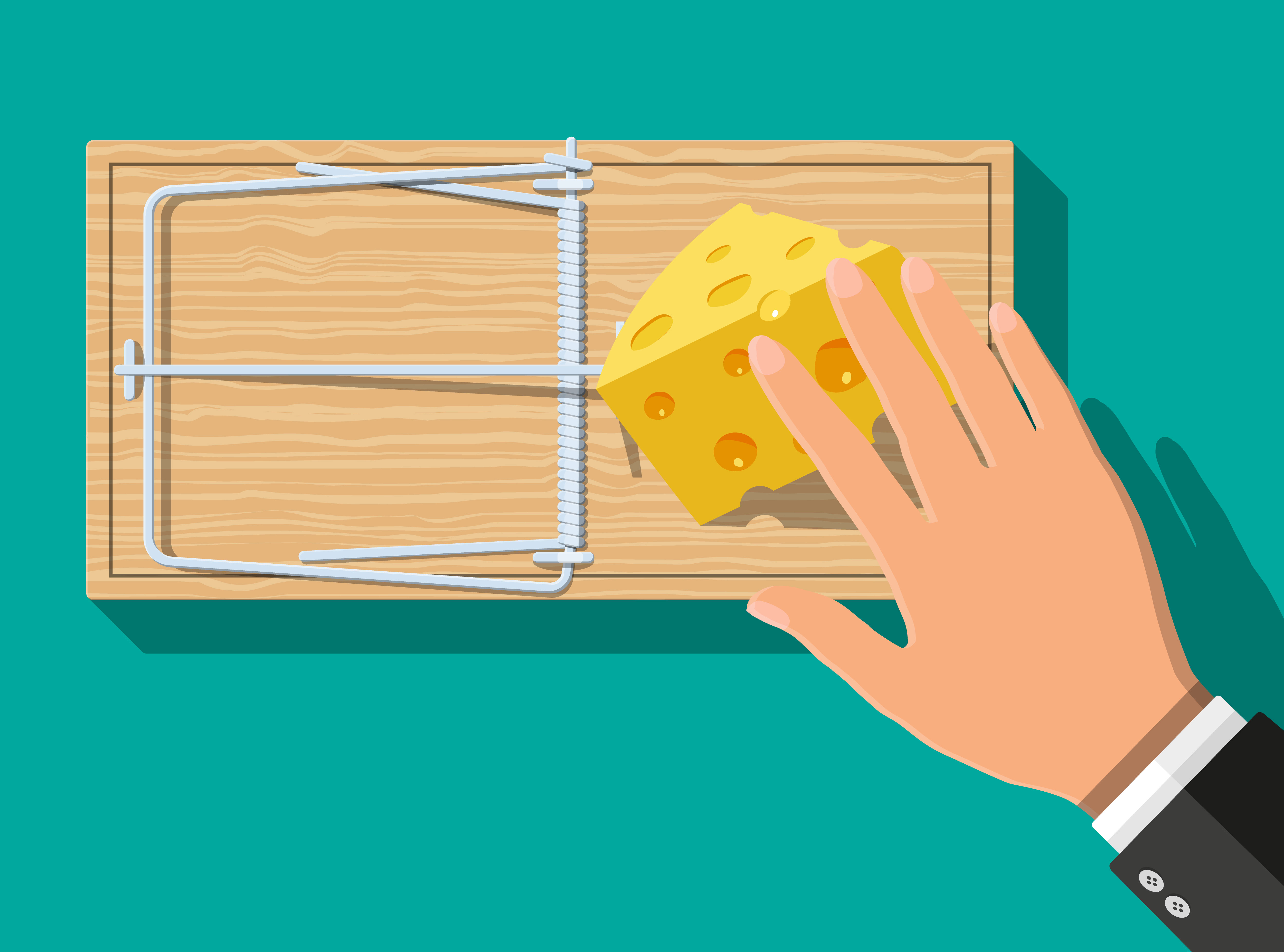 Hand with cheese trap (Shutterstock)